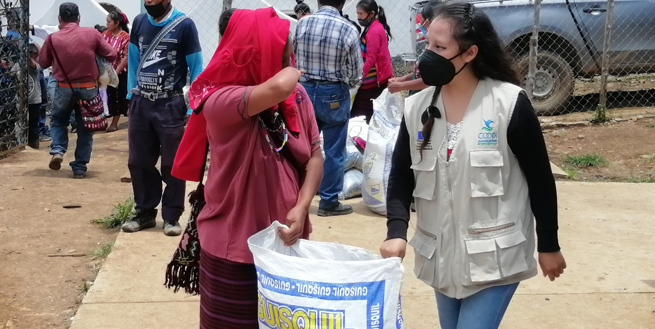 Guatemala. Margarita goes beyond her disability to improve her family's nutrition
